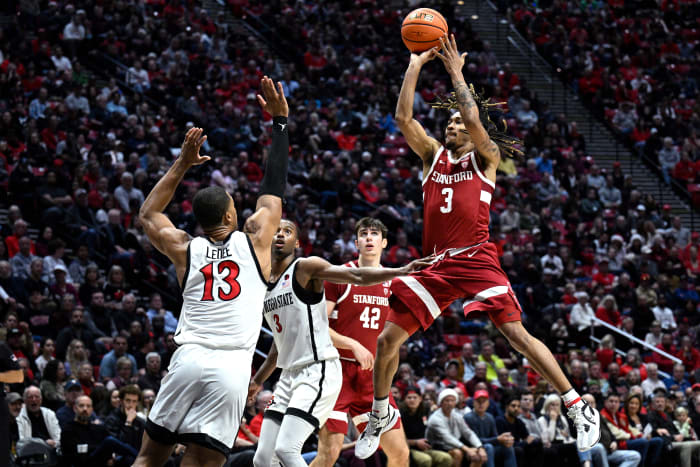 Dec 21, 2023; San Diego, California, USA; Stanford Cardinal guard Kanaan Carlyle (3) shoots the ball over San Diego State Aztecs forward Jaedon LeDee (13) during the second half at Viejas Arena. Mandatory Credit: Orlando Ramirez-USA TODAY Sports